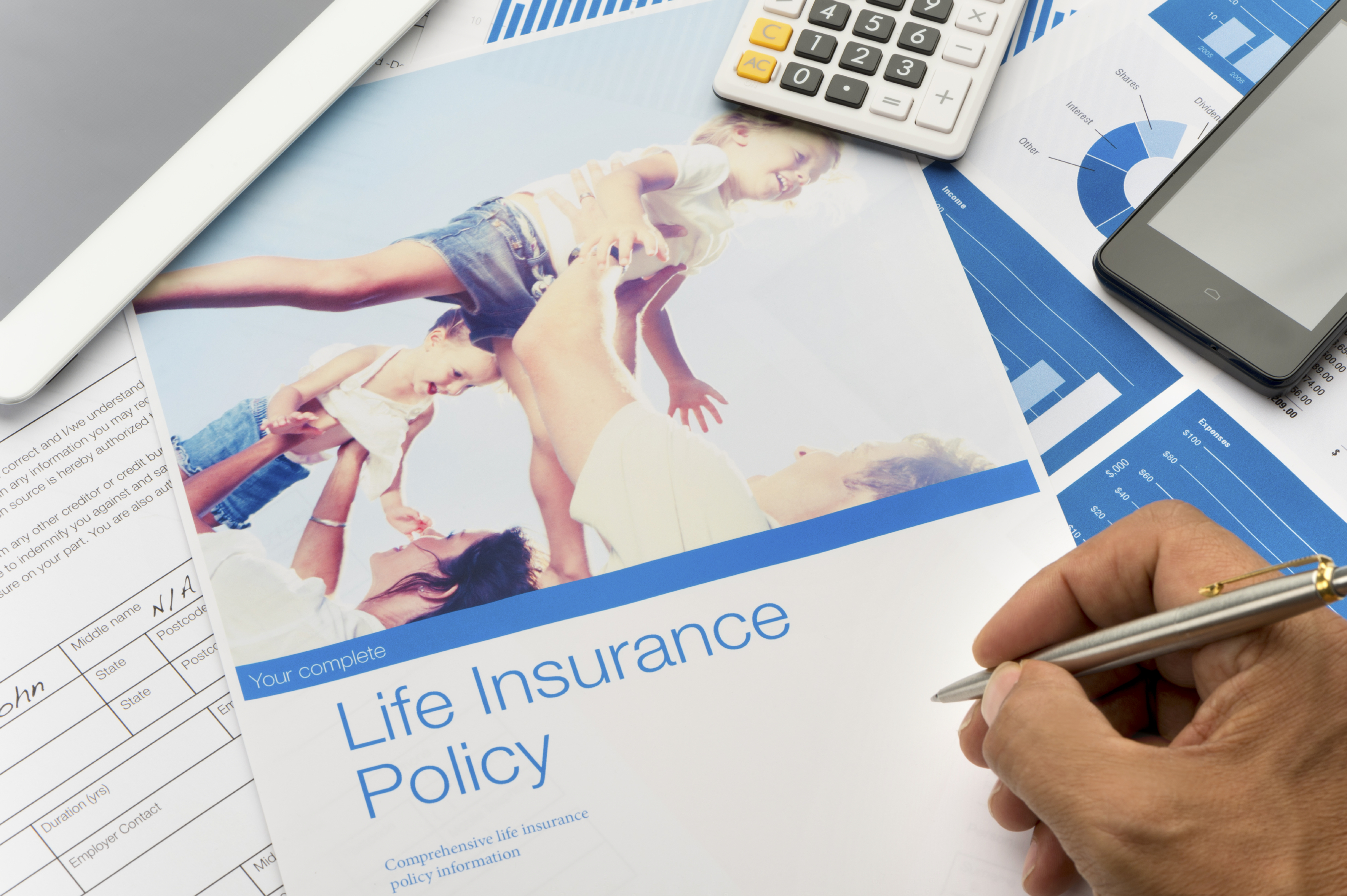 Life insurance brochure with family image and paperwork. The included image can be found in my portfolio. Image  #37803180